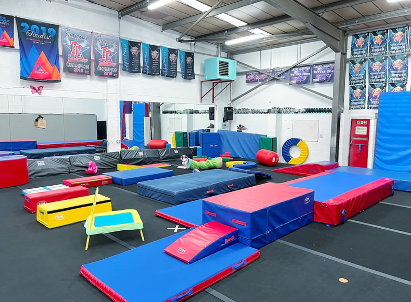 Inside the ACA gym with soft play and tumbling equipment